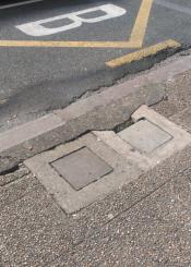 Alcantarilla en mal estado